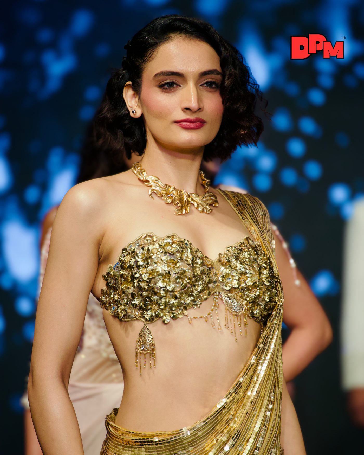 Runway — gold couture look